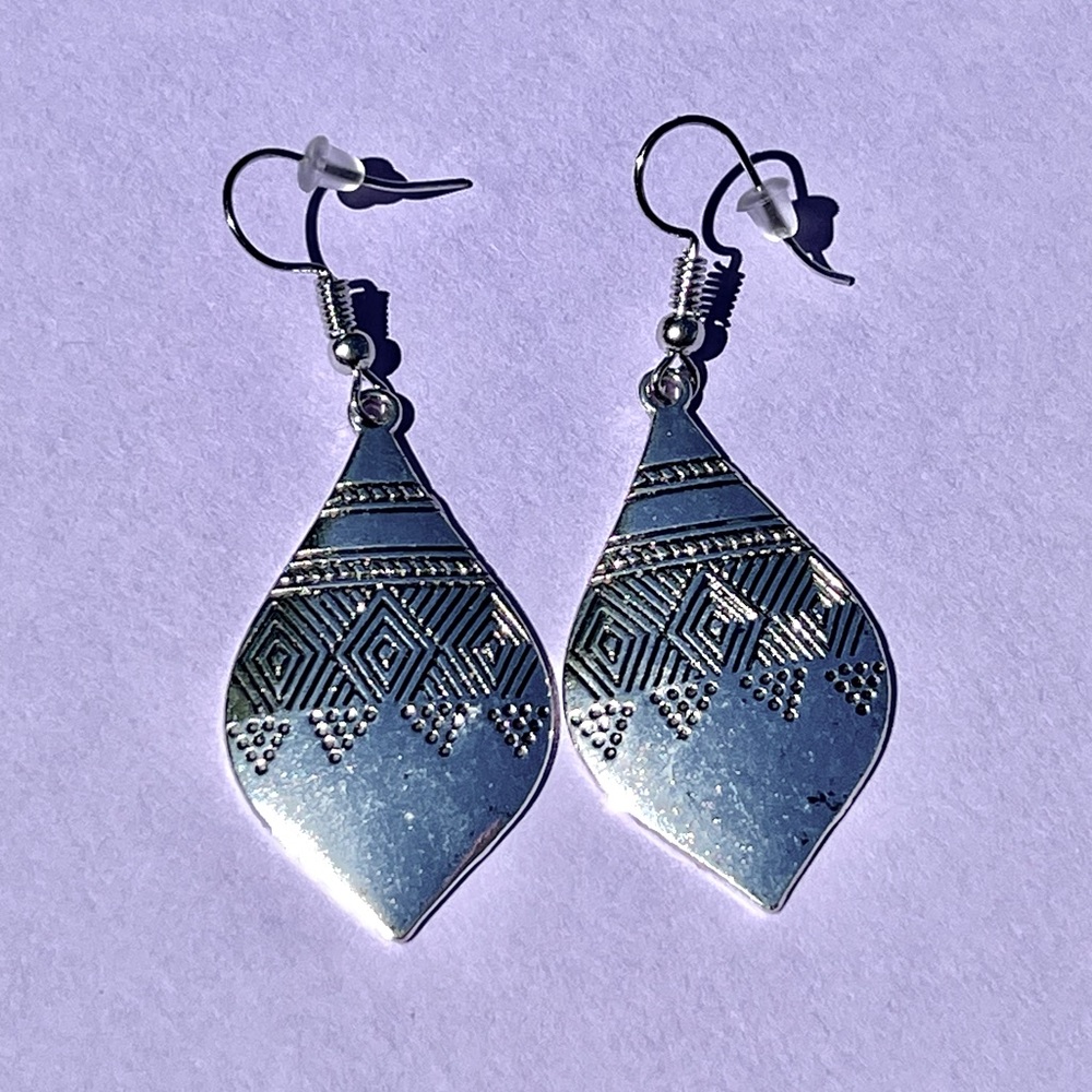 Silver tone dangle earrings